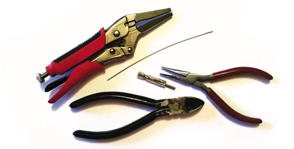 Assorted pliers and tools for wire work