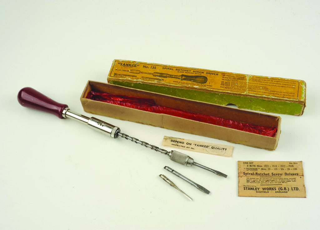 Vintage spiral ratchet screwdriver with box and bits.