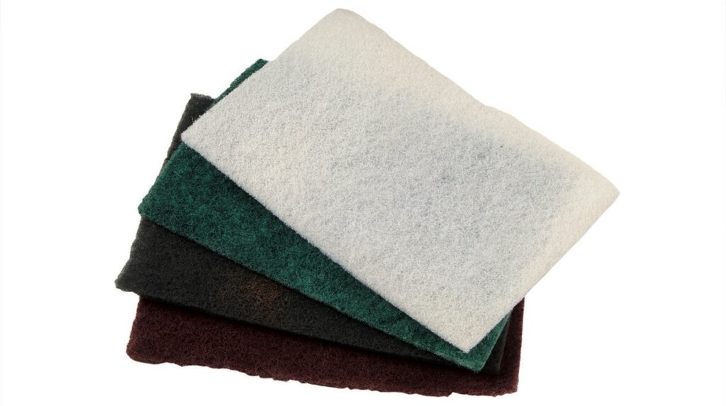 Stack of coloured scouring pads