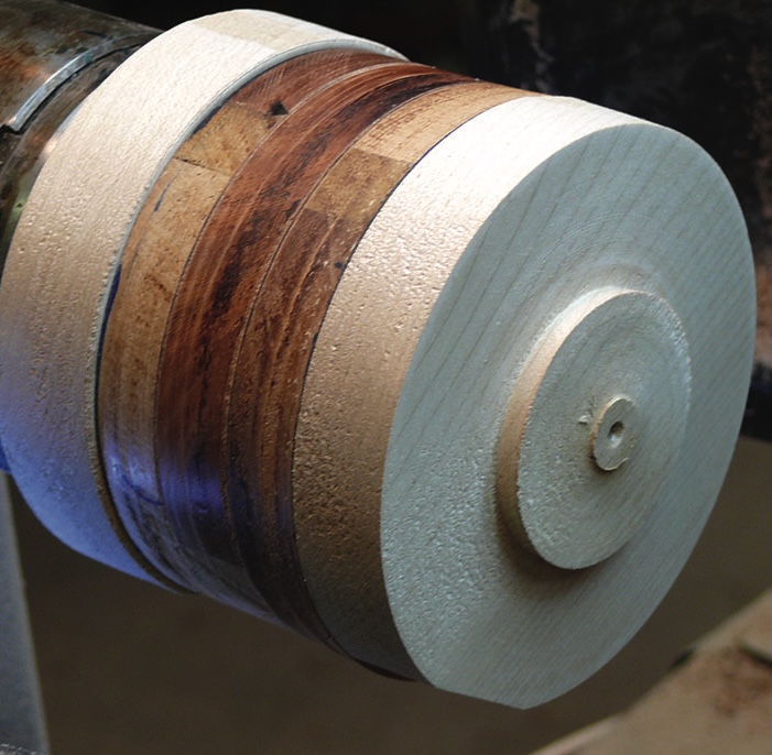 Wood turning on lathe with layered design