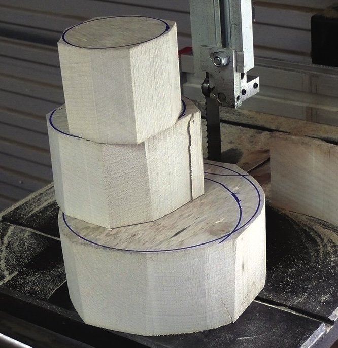 Stacked wood blocks on bandsaw machine