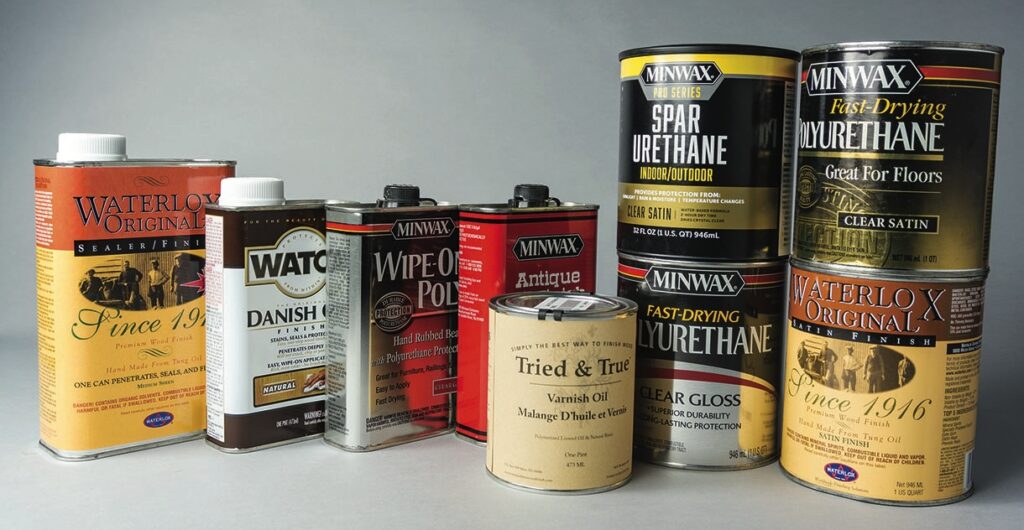 Various wood finish and varnish cans displayed.