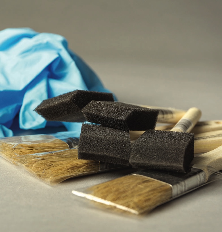 Art supplies: brushes, foam sponges, protective gloves.