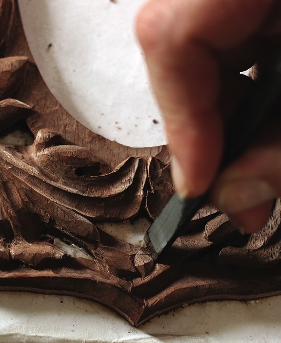 Hand carving intricate wooden design