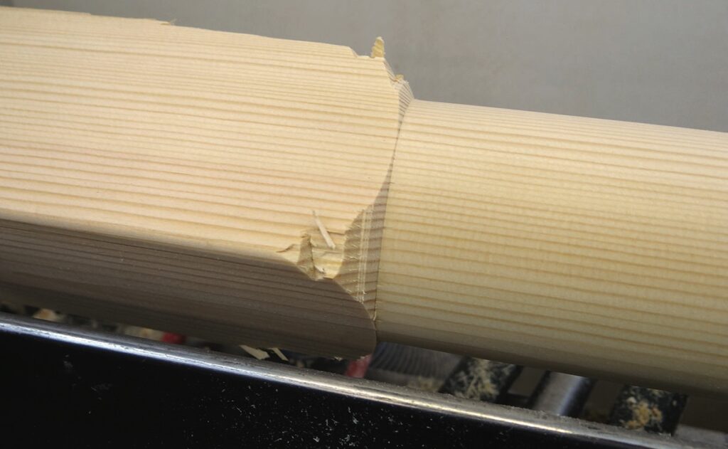 Wood with splinter from machine cutting error.