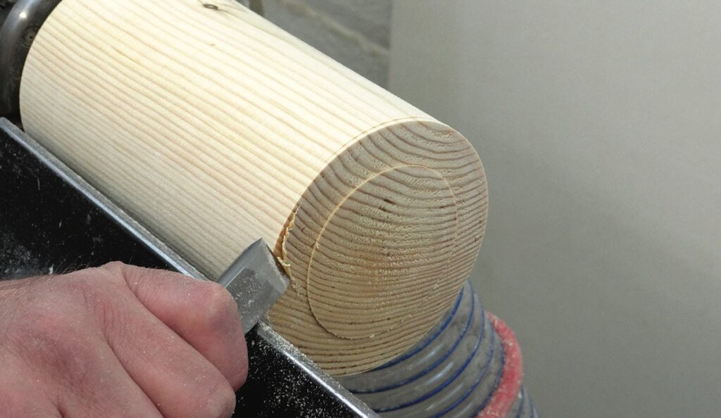 Woodturning with lathe and chisel