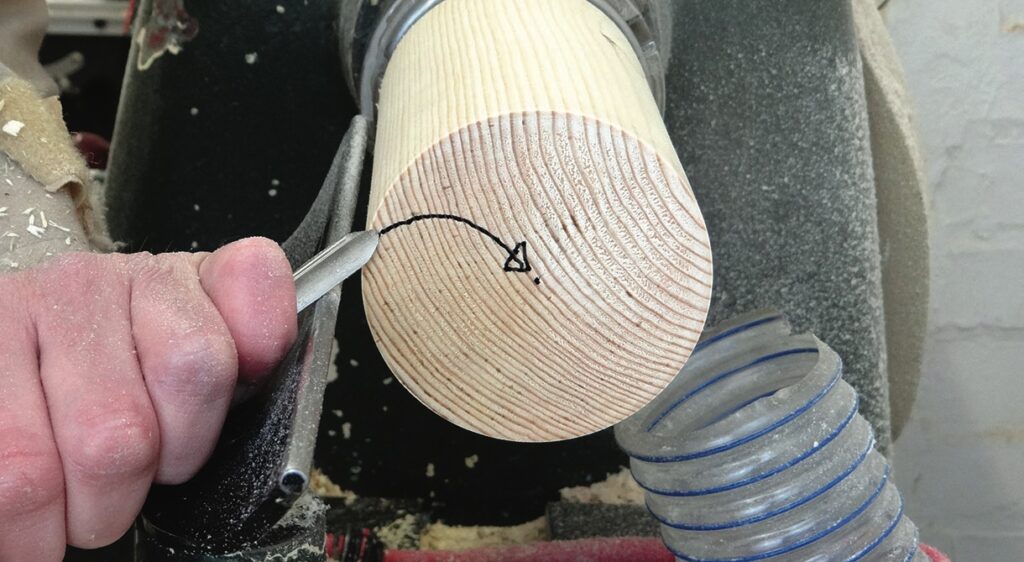 Hand woodworking on spinning lathe with closeup view.