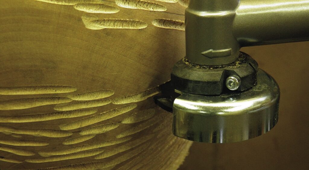 Close-up of a wood carving machine