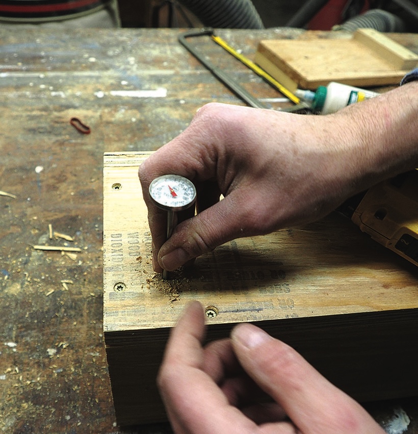 Person using chisel on wooden block
