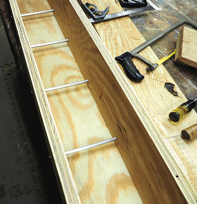 Wooden box and tools on a workbench