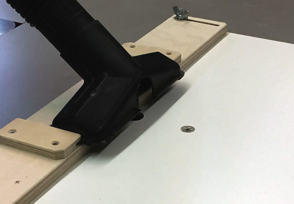 Router vacuum attachment on woodworking table