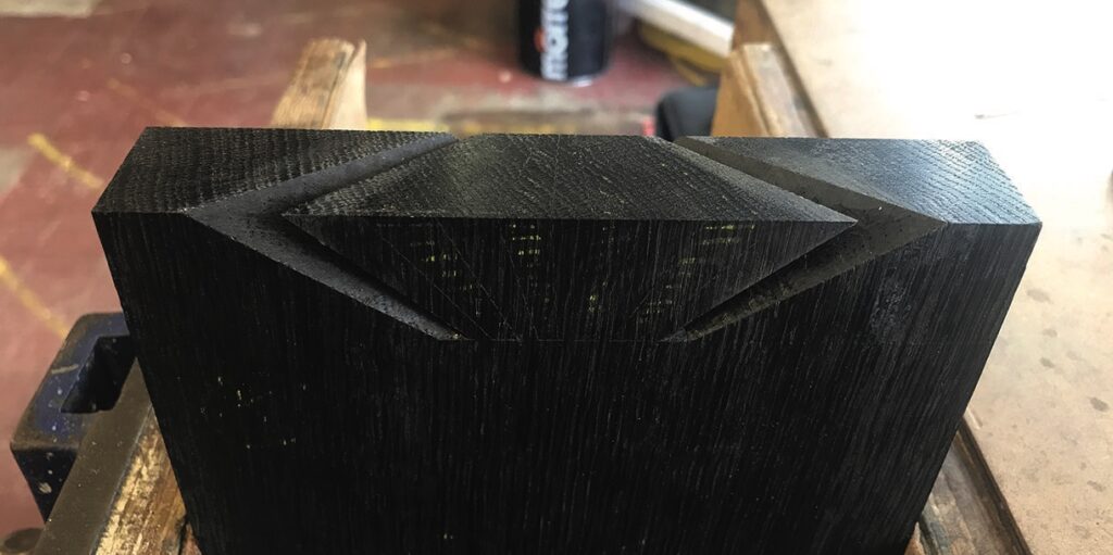 Close-up of black wooden joint detail