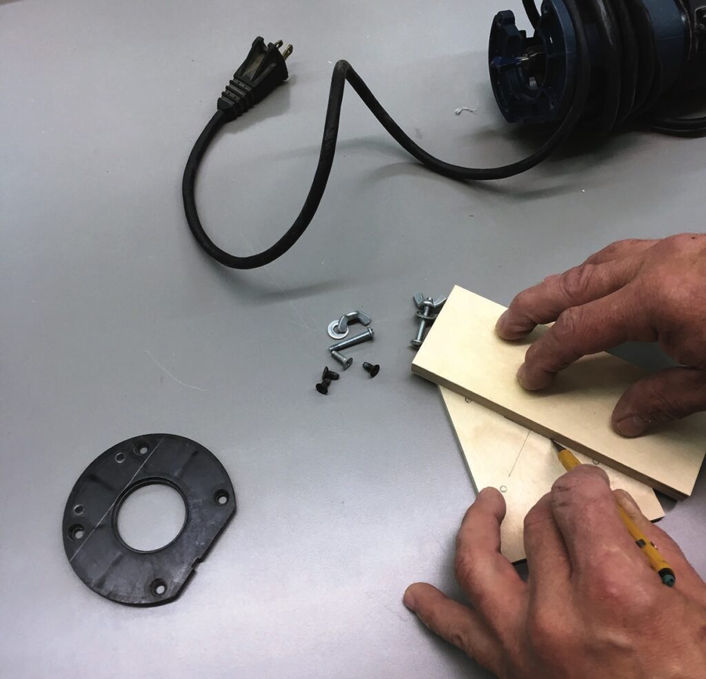 Person assembling hardware components with tools.