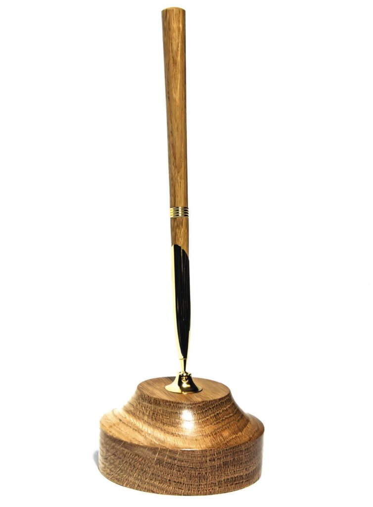 Elegant wooden pen with a round base holder.