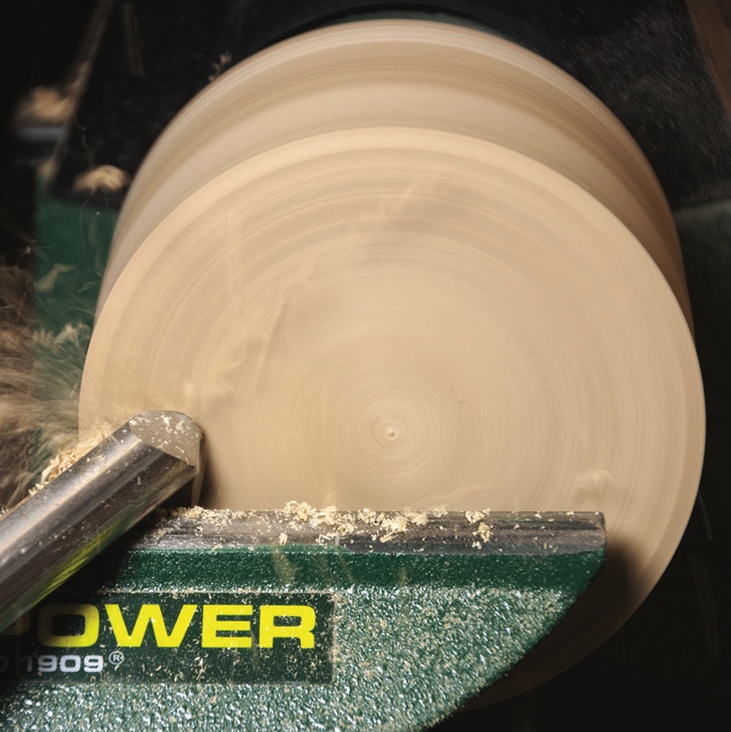 Woodturning in action with a lathe.