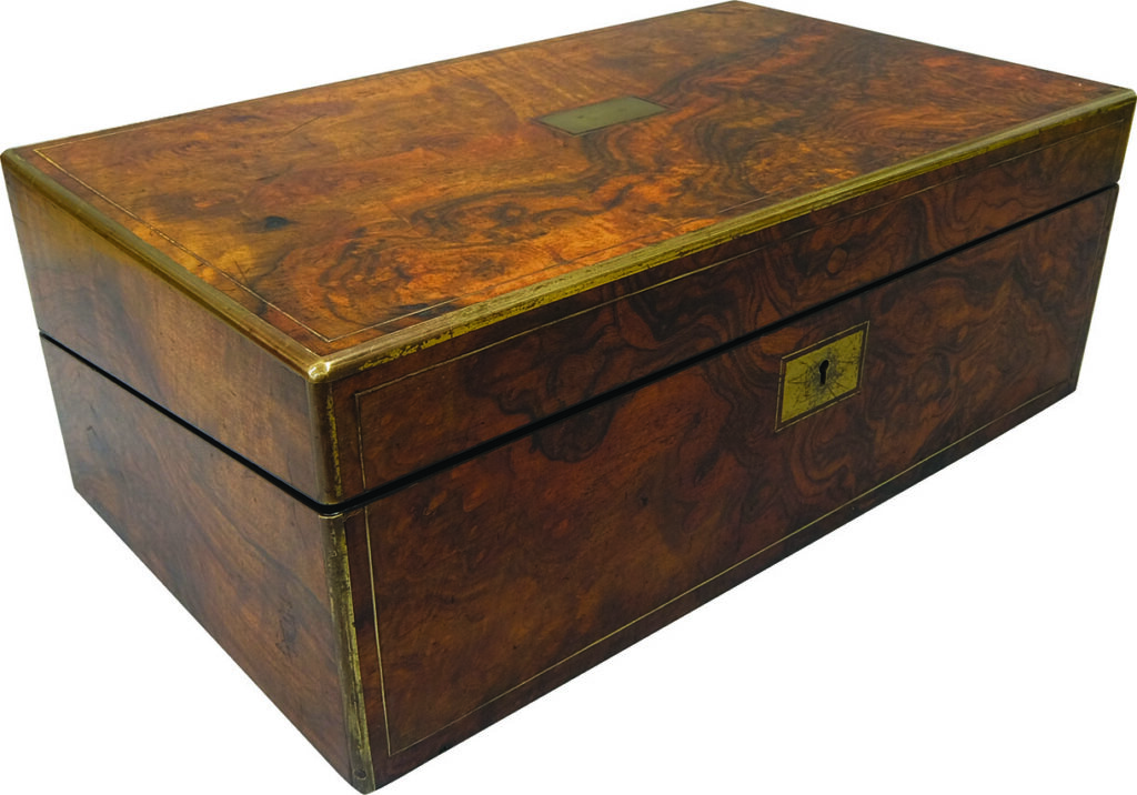 Antique wooden box with brass accents and keyhole