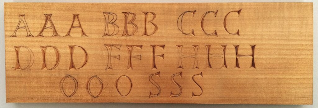 Carved wooden letters AAA to SSS