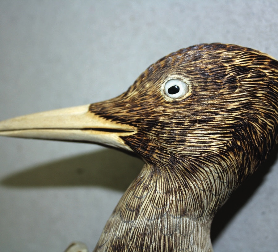 Close-up of a carved wooden bird sculpture