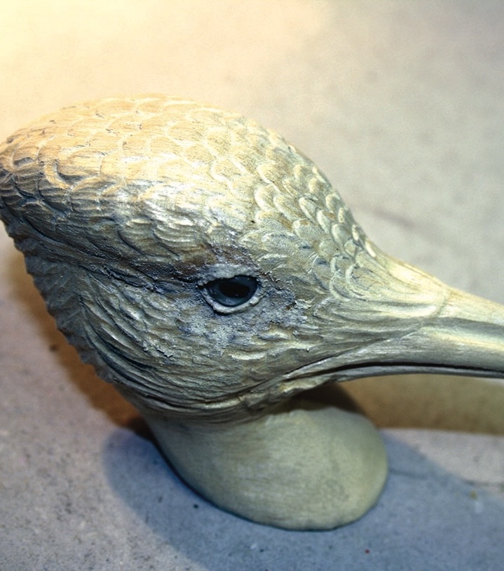 Wooden sculpture of a bird head