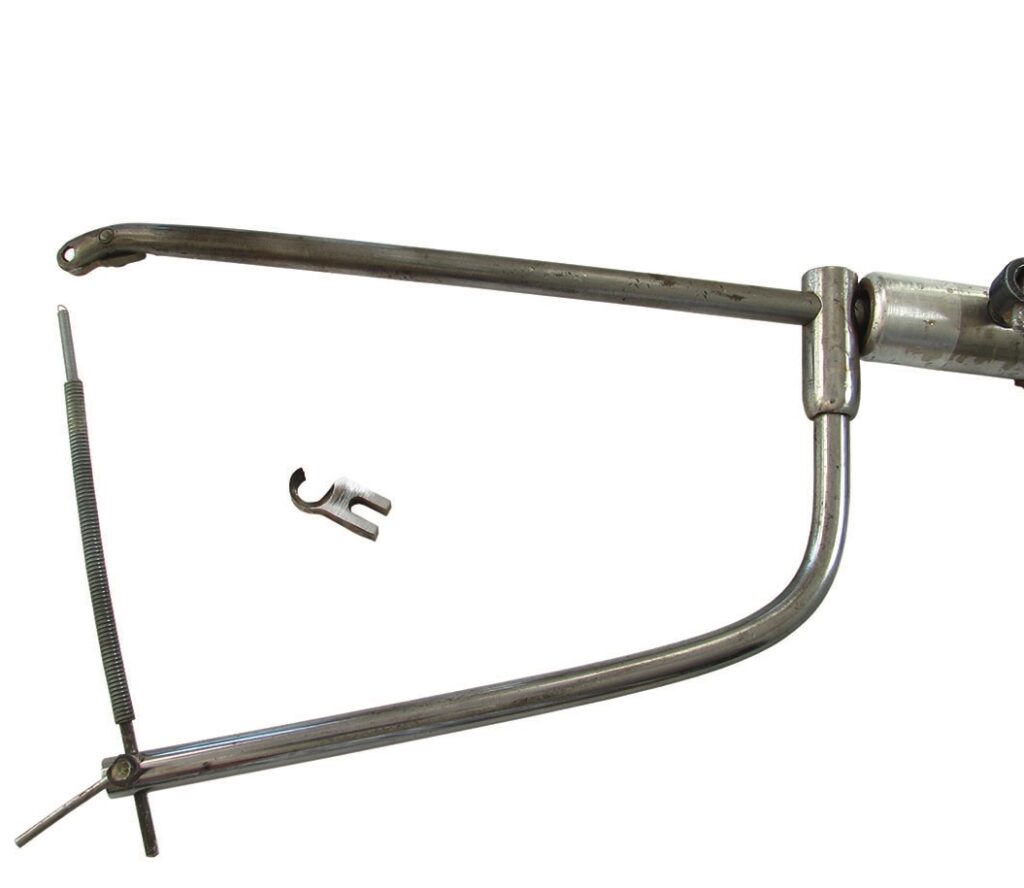 Metal dental appliance tool with spring and clip.