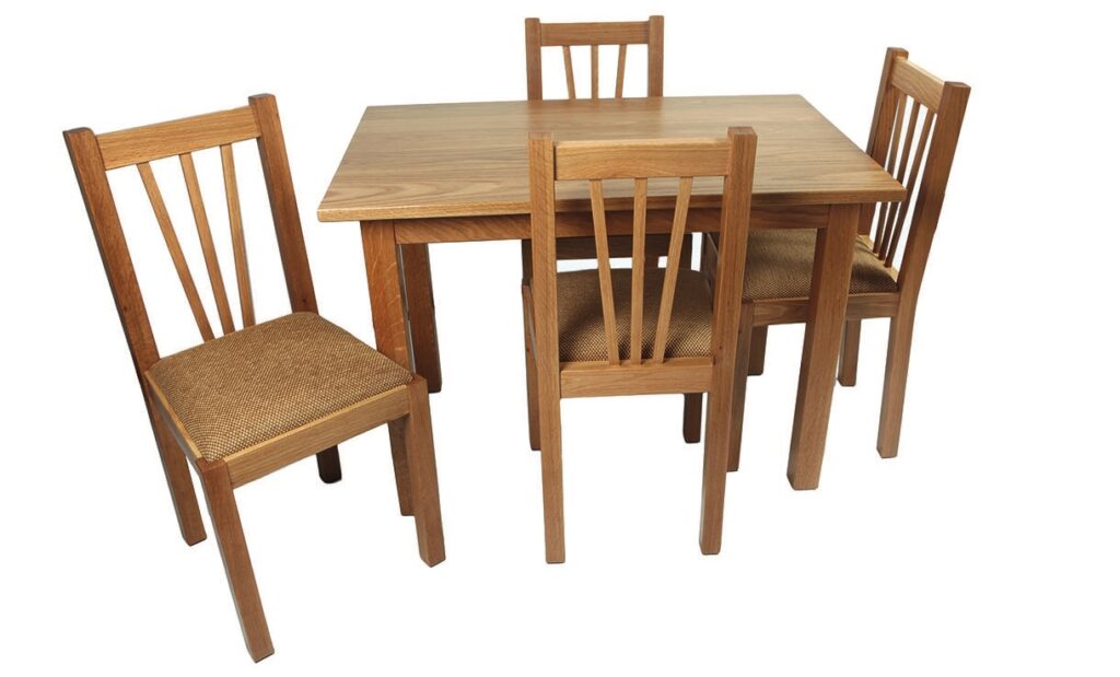 Wooden dining table with four chairs