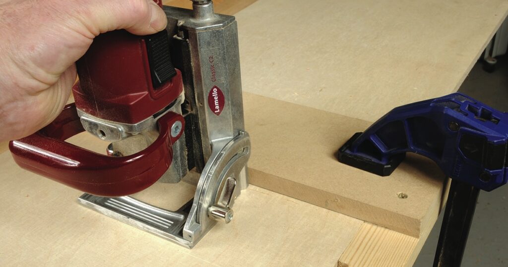 Using biscuit joiner on wood with clamp