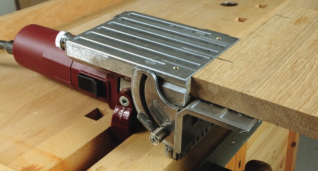 Wood being cut with a biscuit joiner tool.