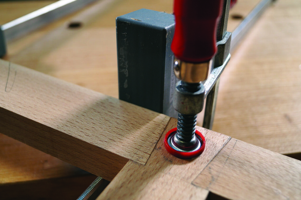 Wood joint secured with a clamp
