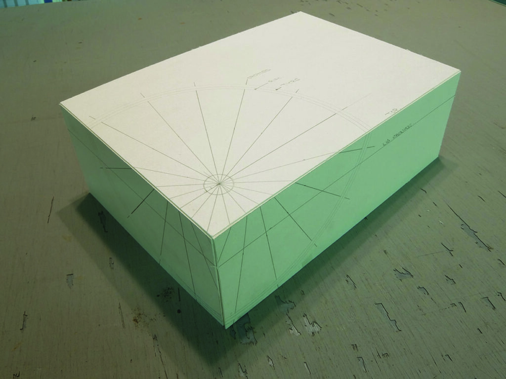 Box with geometric design on a table