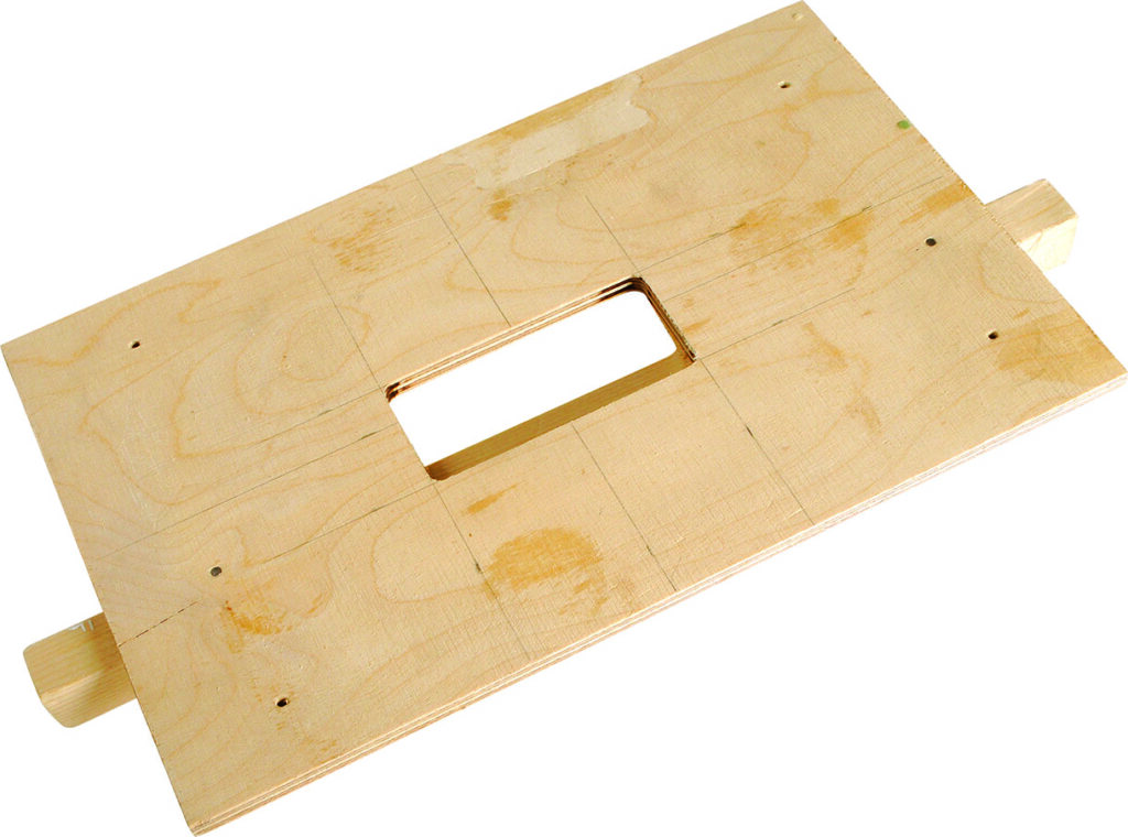 Wooden panel with central rectangular cutout