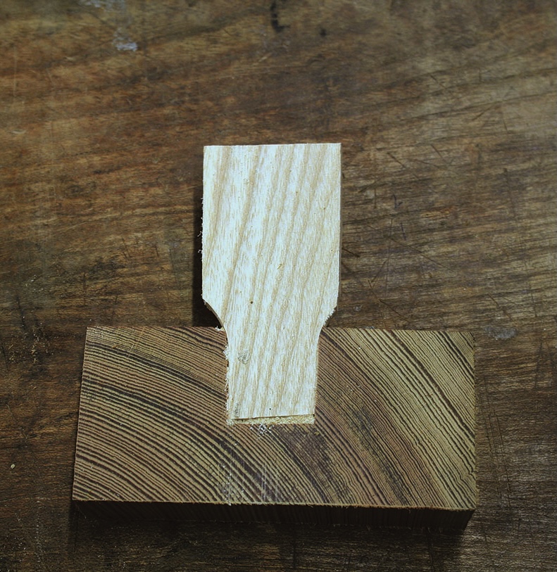 Wooden mortise and tenon joint on table