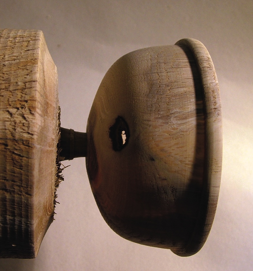 Close-up of wooden yoyo with a hole