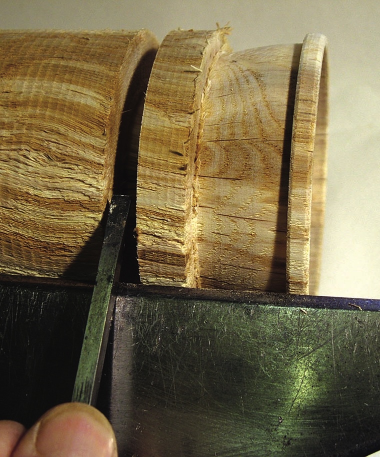 Woodcrafting with chisel and cylinder joint detail