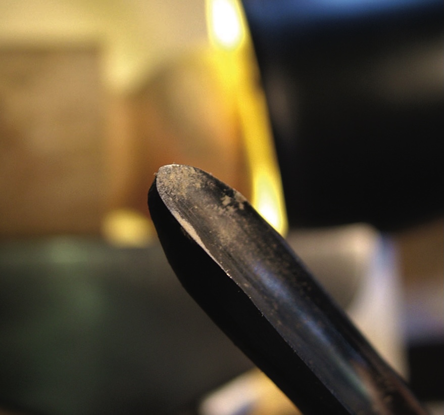 Close-up of a pencil on a desk.