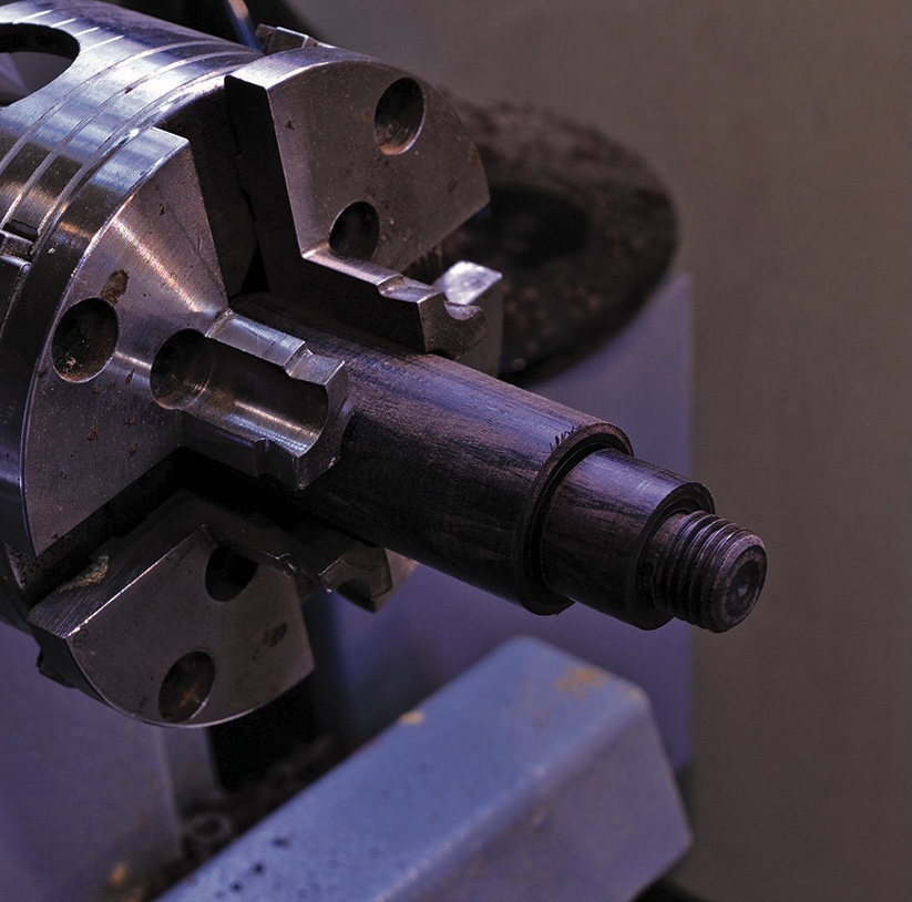 Close-up of metalworking lathe chuck tool.