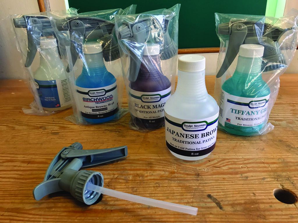 Collection of patina products with spray nozzles