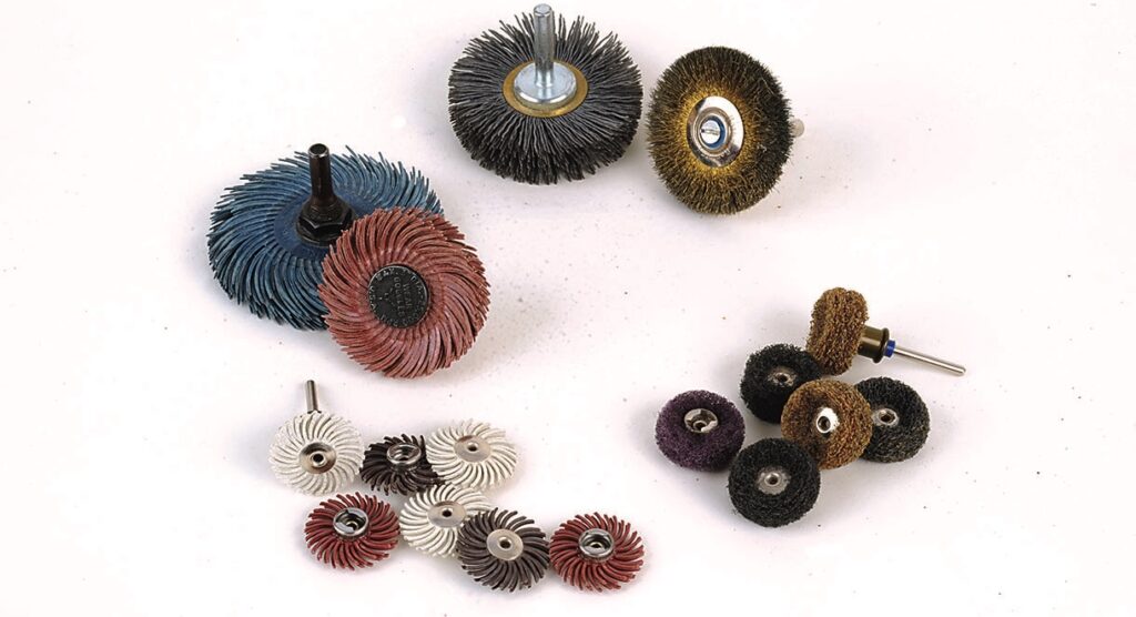 Assorted wire and sanding wheels for drill attachments.