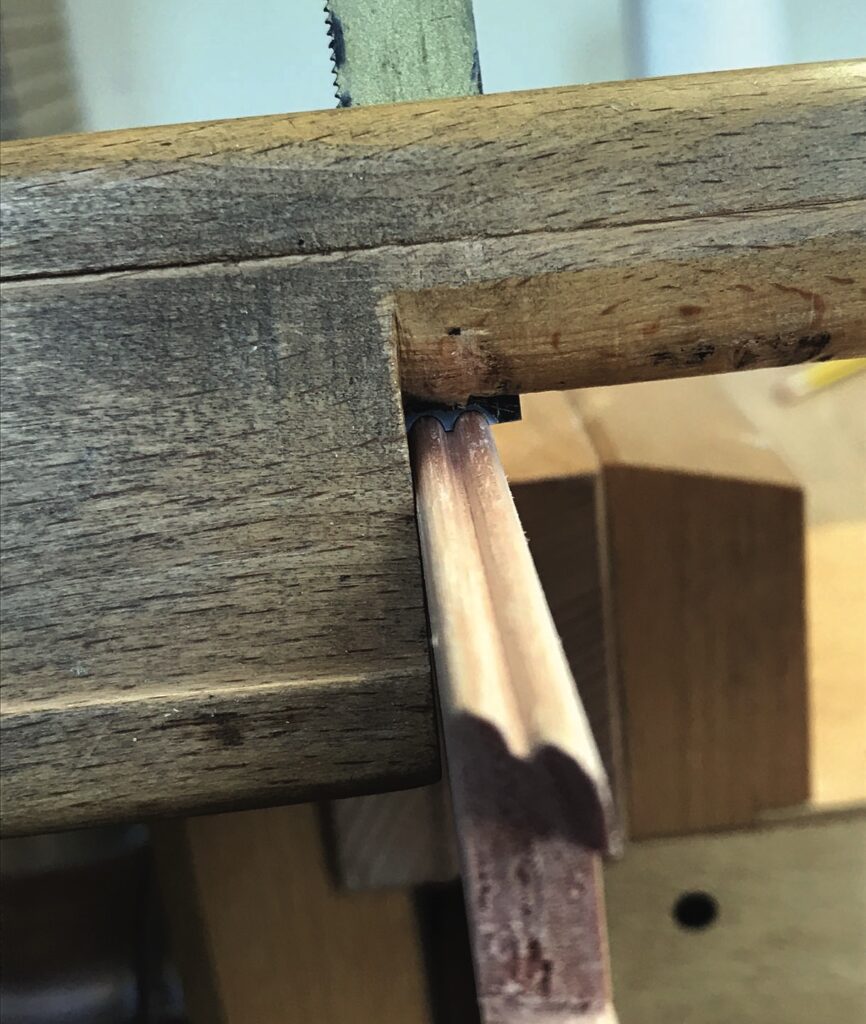 Wooden hand plane shaving wood curl