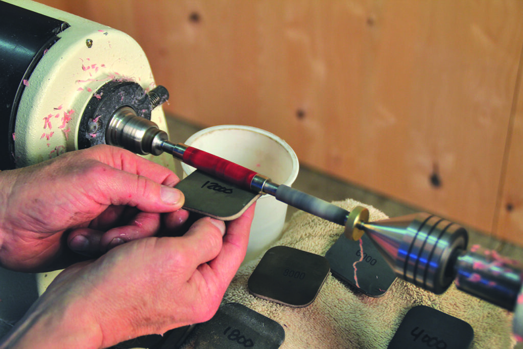Using sanding tools for woodworking project.
