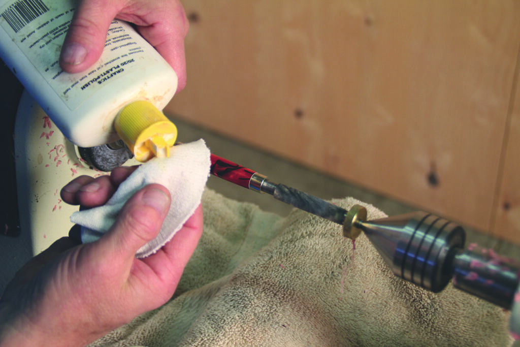 Applying polish to a wood lathe project