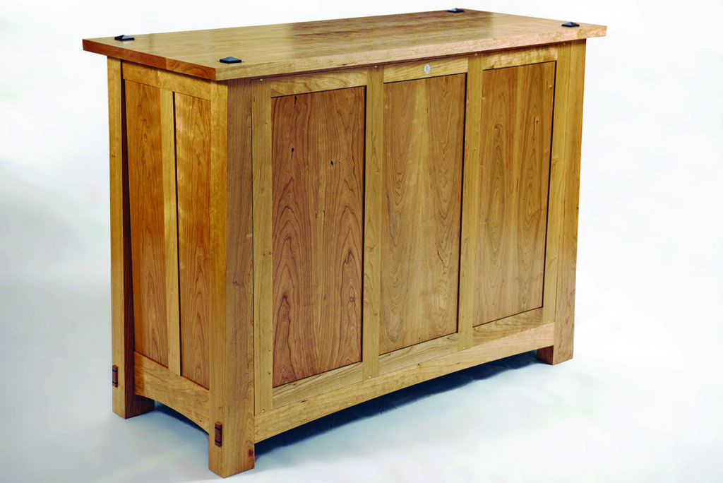 Wooden cabinet with panelled doors