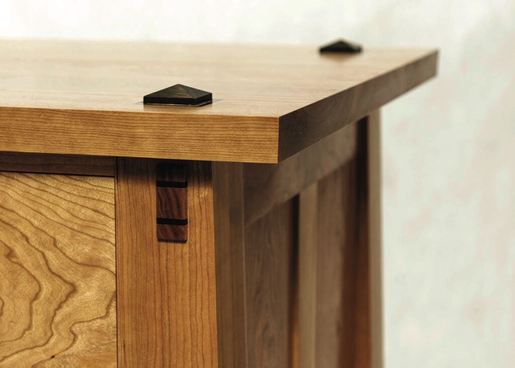 Close-up of wooden furniture with decorative accents.