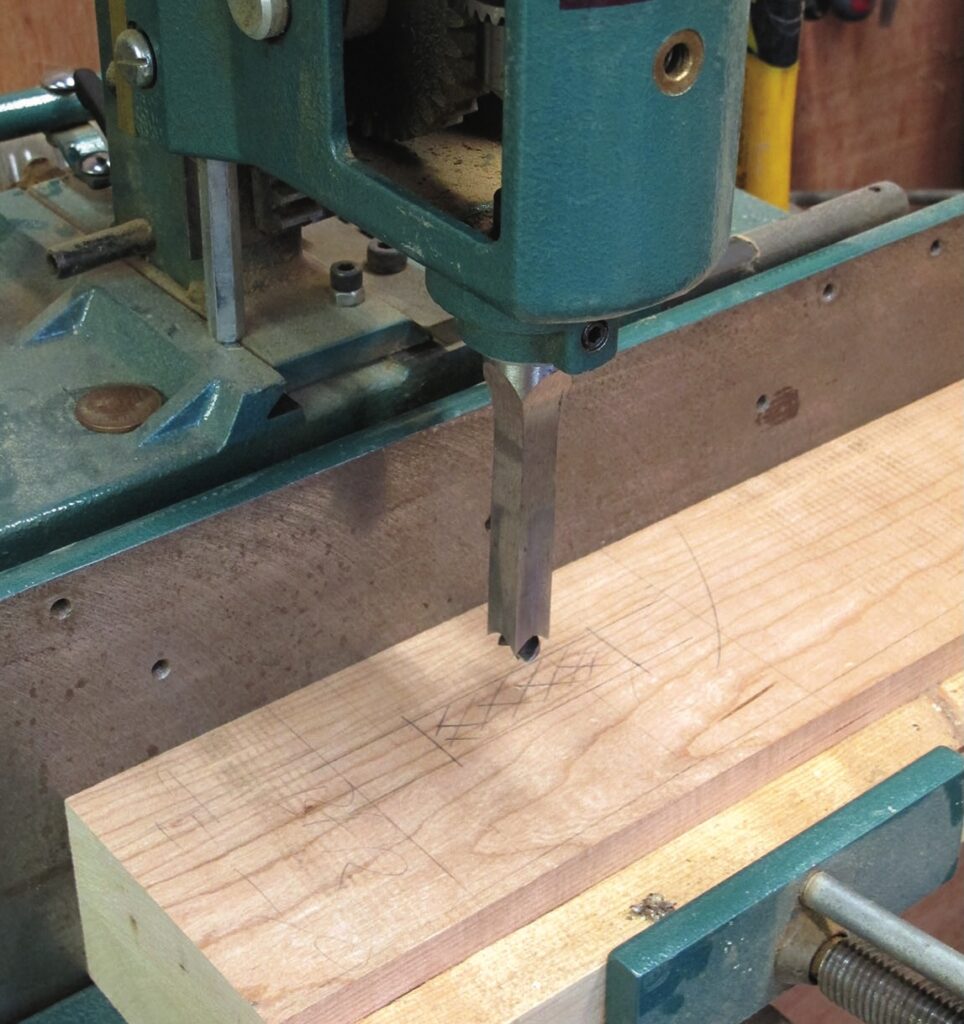Woodworking mortising machine in action
