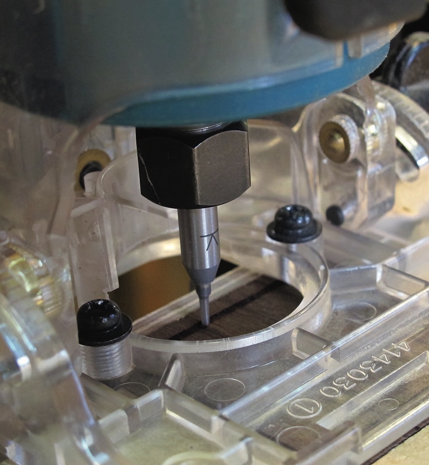 Close-up of CNC router cutting wood.