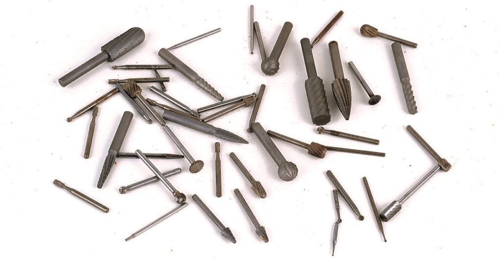 Assorted metal cutting and shaping drill bits.