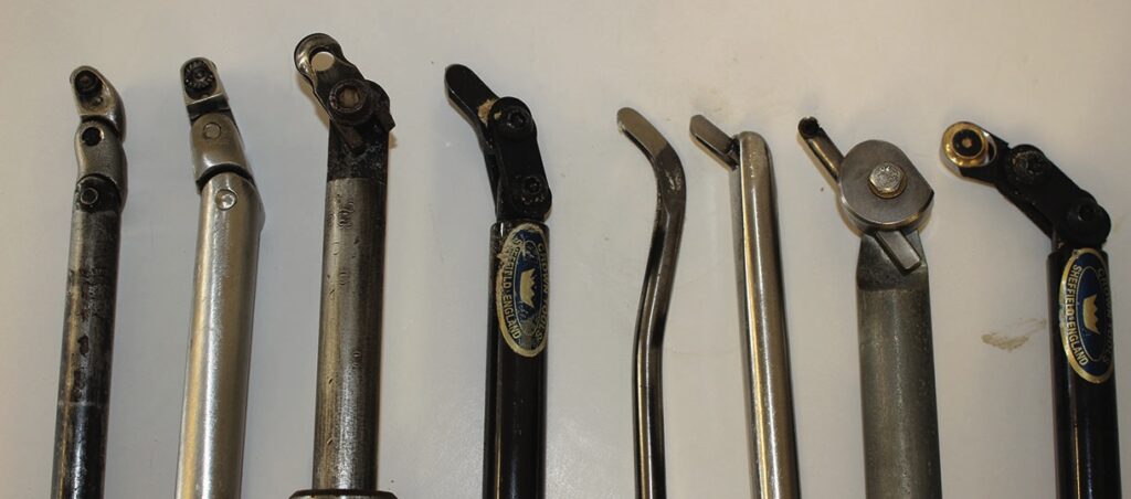Eight lathe cutters with metal handles