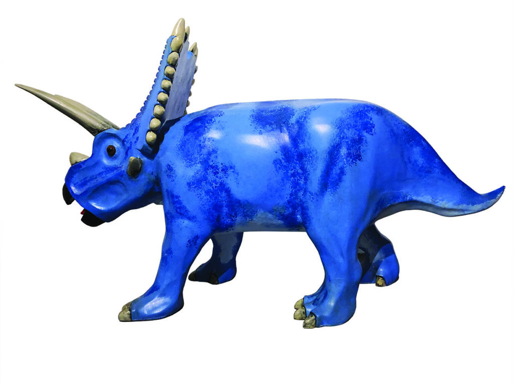 Blue triceratops dinosaur sculpture with horns
