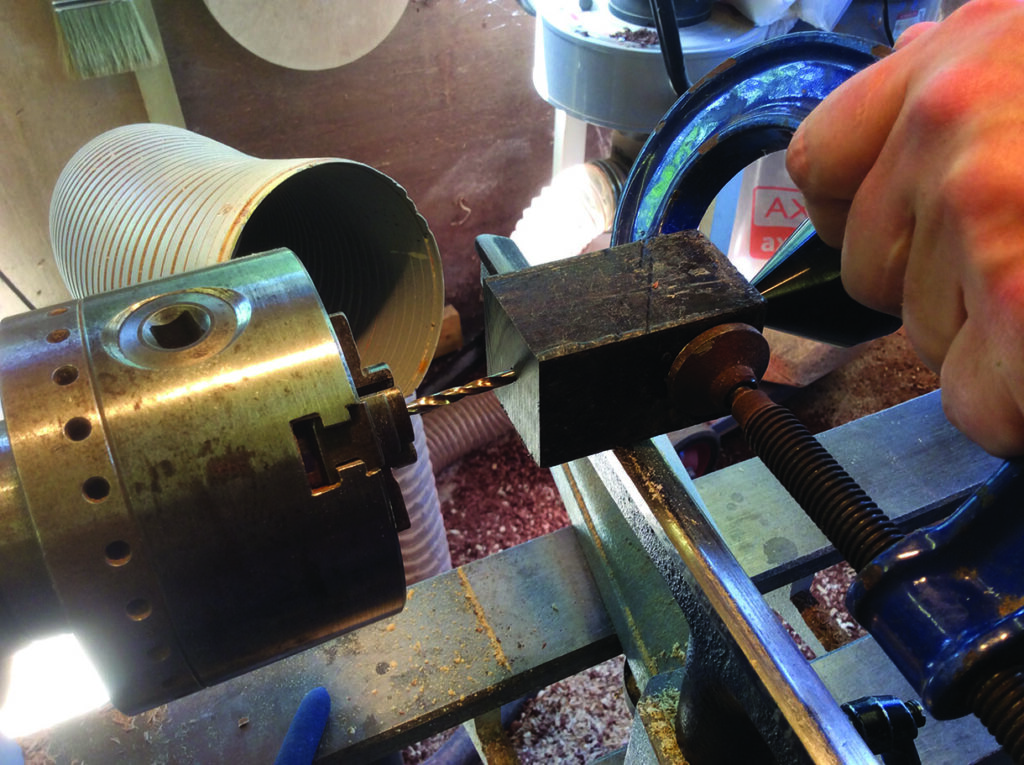 Woodworking with lathe and clamp