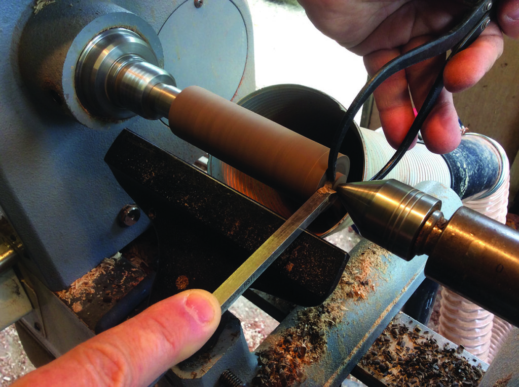 Using lathe machine for woodturning craftsmanship