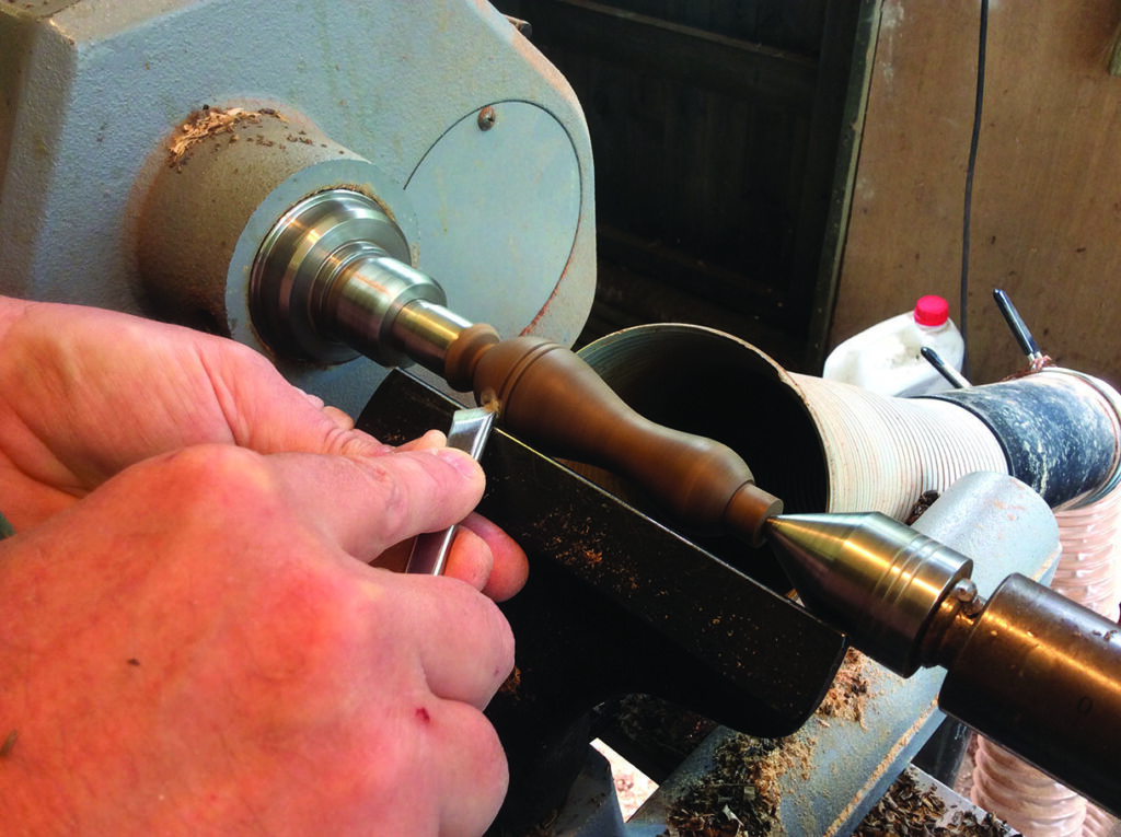 Woodturning a spindle on a lathe machine